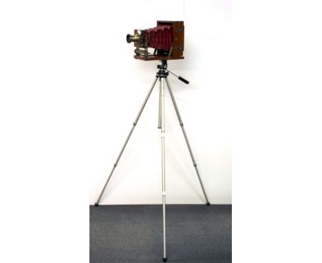 A superb 19th century mahogany Lancaster Special Patent plate camera, together with two plate cases and hood on a modern trip