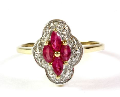 A 9ct yellow gold ruby and diamond set ring, (L.5).