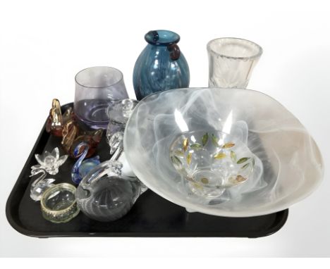 A group of glass swan paperweights, a Caithness vase, further studio glass twin handled vase and other pieces of crystal.