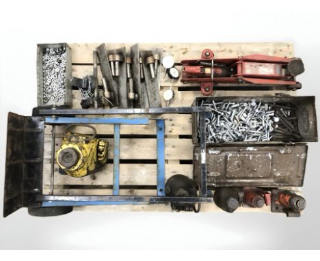A pallet of hard ware and tools including jack, sack barrow, assorted nuts and bolts, hinges etc 