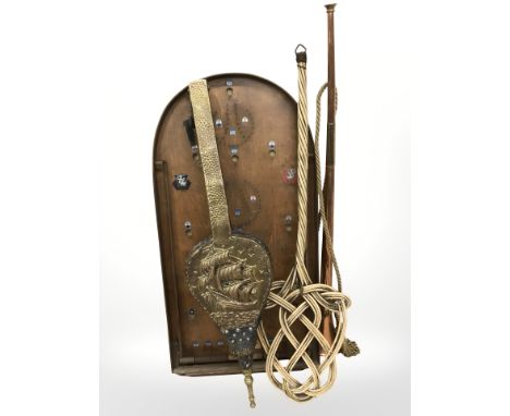 A bagatelle board, a copper horn, a carpet beater and a set of brass mounted bellows.