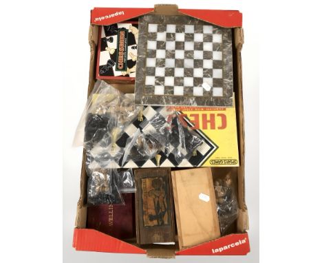 A quantity of chess sets and boards, including a boxwood chessmen turned and ebonised set in original box, polished marble ch