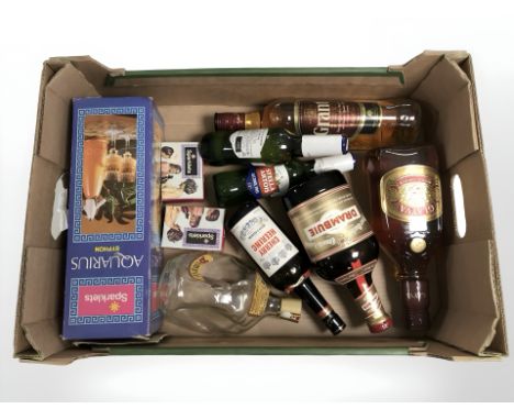 Several bottles of alcohol including Glayva Scotch liqueur , Grant's , two boxes of Sparklets soda sypohon canisters, further