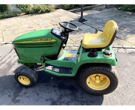 A John Deere GT245 garden tractor, 20 HP V-Twin engine, 574.8 hours, with user manual, two keys.  CONDITION REPORT: Seems in 