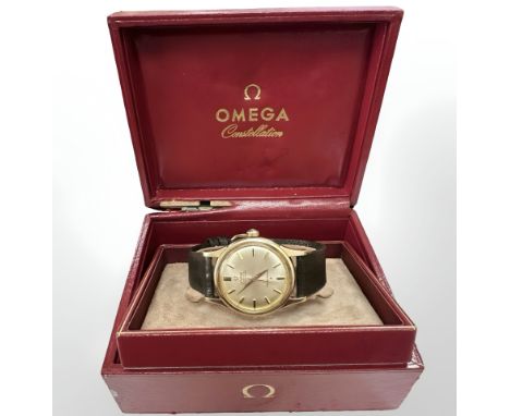 A gent's vintage 18ct gold Omega Constellation automatic chronometer wristwatch, silvered dial with baton numerals, Omega cro