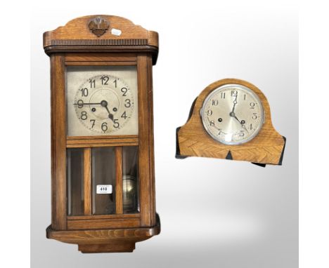 An early 20th century continental wall clock with silvered dial and an art deco mantel clock 