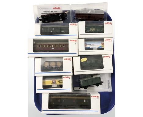 Eleven various Marklin HO gauge diecast scale model passenger cars and tenders, as illustrated, mostly boxed.