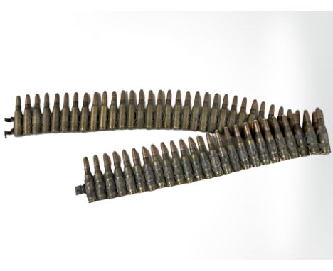 A British Army belt of 59 linked 7.62mm L2A2 inert rounds 