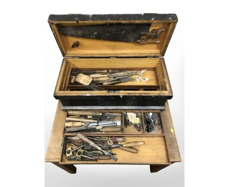 An antique tool box containing carpentry tools, chisels, Bailey 6 plane etc 