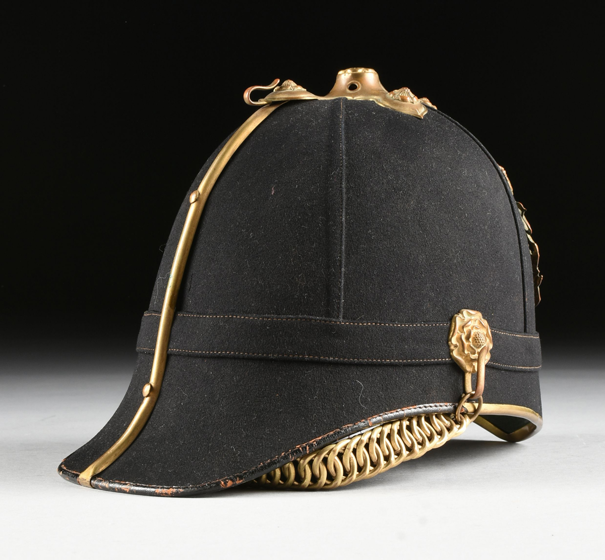 A GROUP OF THREE BRITISH MILITARY HATS, CIRCA 1900-1950, comprising a ...