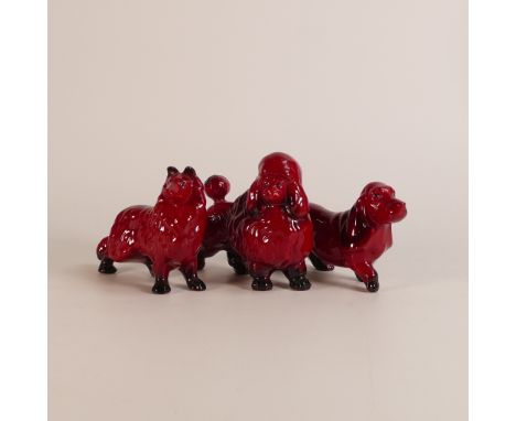 In the manner of Bernard Moore, three Flambe models of a Poodle, Border Collie and a Basset Hound. Unmarked. (3)