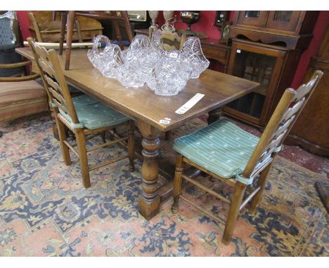 Oak refectory dining table ( L: 168cm W: 83cm H: 77cm) and set of four rush seated ladder back chairs