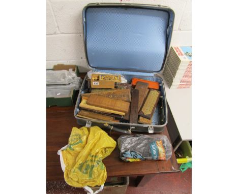 Suitcase containing collection of cribbage boards