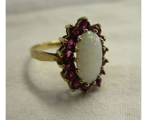 Gold opal &amp; ruby set ring