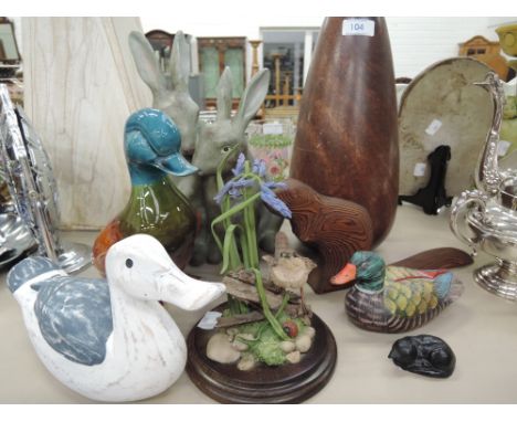 A selection of vintage ceramic and treen decorative items including duck, cat, beaver, rabbits