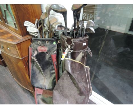 Two sets of vintage golf clubs, including Howson