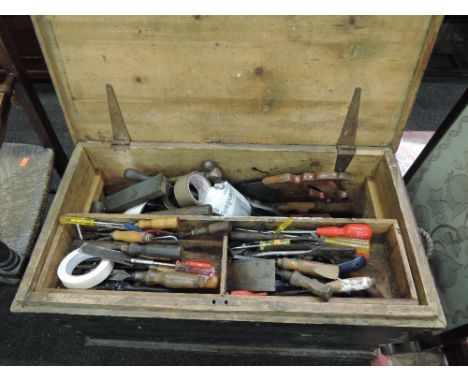 A vintage tool box and selection of woodworking and other tools
