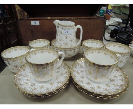 A part tea coffee service by Spode in the Fleur De Lys Gold pattern