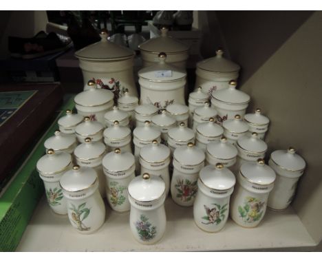 A large selection of the Flower Fairy Spice jars also includes treen rack