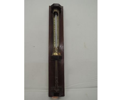 A brass thermometer scale, by Short & Mason, London, number 110/96T on treen stand