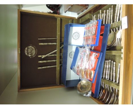 A part canteen of Thai 'bronze' cutlery having moulded bamboo style handles, and other additions including ladle and cake for