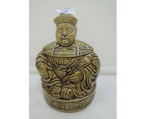 A vintage ceramic tea caddy in the form of a Chinese man made by Sadler