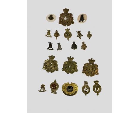 8 Surrey/ Sussex/Hampshire Badges. The Hampshire Regiment Helmet Plate, 2 67th Foot Shako and Glengarry Badge, 70th Foot, Sha