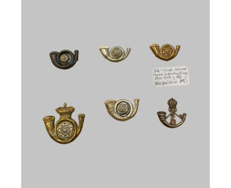 24 Cap Badges Herefordshire, Somerset Light Infantry, Various Volunteer Light Infantry, Yorkshire Light Infantry and Others. 