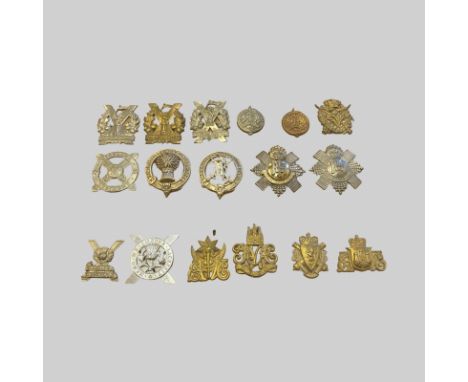 17 Cap Badges Tyneside Scottish, Highland Regiment, Lowland Regiment, Highland Light Infantry and Others.   Good Condition.  