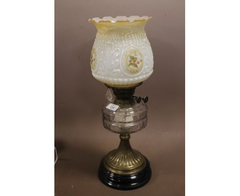 A VINTAGE BRITISH MADE BRASS AND GLASS OIL LAMP WITH FLORAL SHADE 