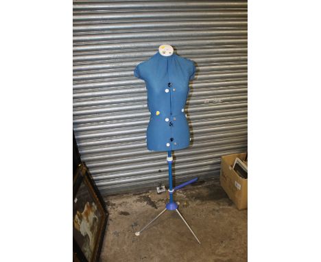 AN ADJUSTABLE DRESSMAKERS MANNEQUIN 