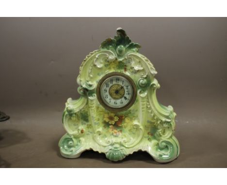 A VINTAGE CERAMIC MANTLE CLOCK WITH FLORAL DETAIL 