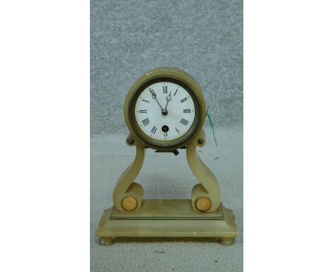 A 19th century carved alabaster mantel clock with marble detailing, white enamel dial with black Roman numerals and brass mec