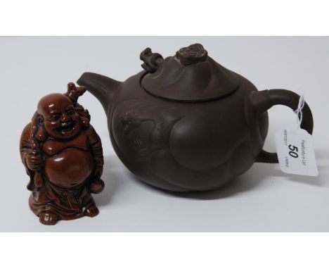 HUANG YULIN:YIXING 'FISH TO DRAGON STYLE TEAPOT, TOGETHER WITH A CHINESE FIGURE OF BUDDHA.