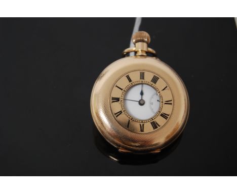 POCKET WATCH WITH KEYLESS MOVEMENT SUBSIDIARY SECONDS DIAL IN A 1/2 HUNTER GOLD PLATED CASE WITH ENGINE TURNED DECORATION.