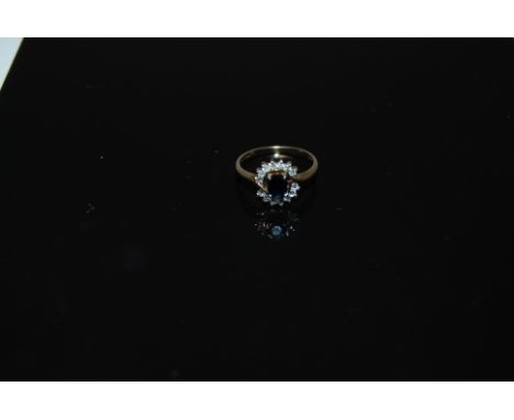 9CT YELLOW GOLD SAPPHIRE & DIAMOND RING.