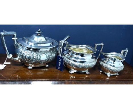 SILVER PLATED THREE PIECE TEA SERVICE, along with other items of silver plate, toilet bottles and a pewter tray