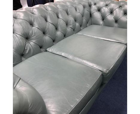 GREEN LEATHER CHESTERFIELD STYLE SOFA, along with two wing back armchairs