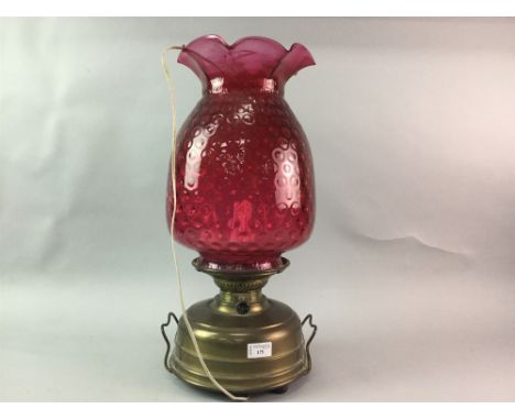 BRASS OIL LAMP WITH CRANBERRY SHADE, converted for electricity