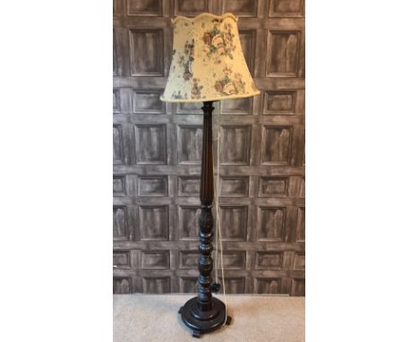 CARVED MAHOGANY STANDARD LAMP, with a floral shade