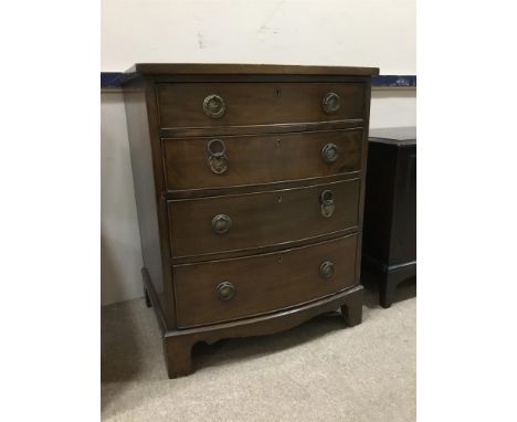 MAHOGANY BOW FRONT CHEST OF DRAWERS, on bracket feet