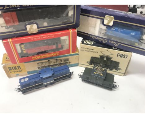 2 X Piko 00 Gauge Locomotives. A Hornby B.R. Shunter #R.050 and 2 x Lima Rolling Stock.