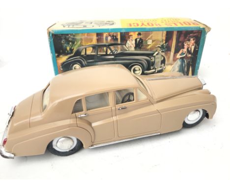 A Boxed CN Toys Rolls-Royce Silver Cloud Bump and Go.