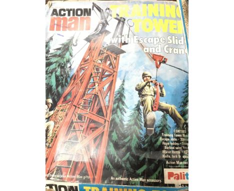 A Boxed Action Man Training Tower  (Box is worn).
