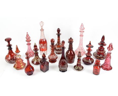 Collection of 19th century ruby and cranberry glass scent bottles, to include a large cut glass ruby and clear glass scent bo
