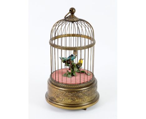 Reuge singing birdcage automaton, the two singing birds, in yellow and blue amongst leaves, the circular base with garlands o