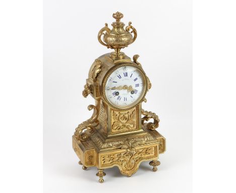 Late 19th / early 20th century French gilt metal mantel clock, the enamel dial with Roman and Arabic numerals signed Negre, S