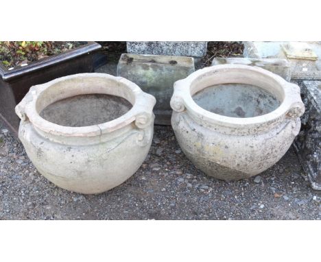 Pair of Compton Pottery terracotta 'scroll' pots, h39cm w52cm d51cm The Compton Potters Art Guild was started by Mary Watts, 