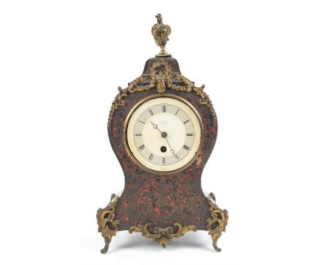 19th century French boulle work mantel clock timepiece, the flame finial over a waisted case with gilt metal mounts, single t