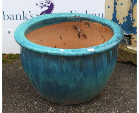 Large turquoise glazed terracotta planter, of baluster form, H41 diameter 64 cm